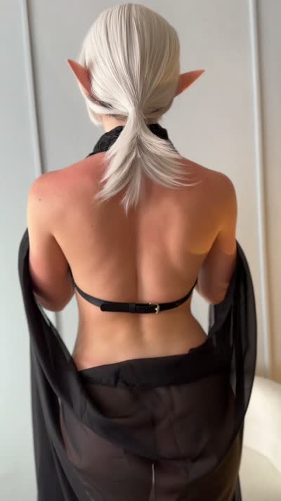 White-haired elf cosplay, bare back