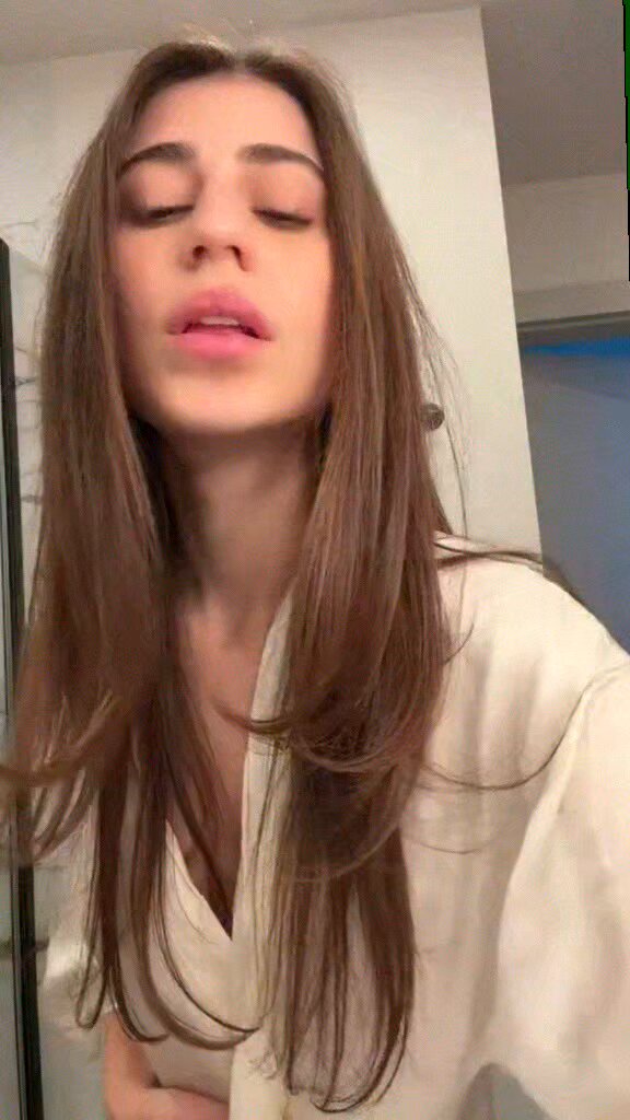 Brunette in a white robe in a bathroom selfie (@BiedermanR80785)