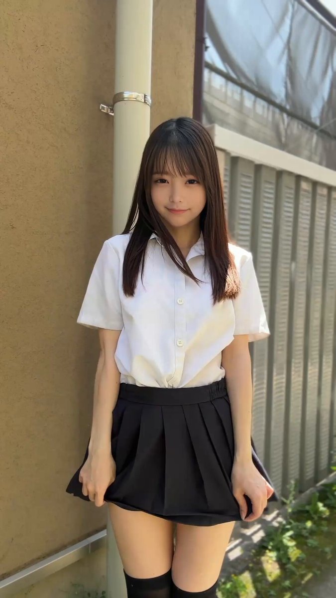 Brunette in a white school shirt, black skirt, and thigh-highs (@hiyori_boochi)