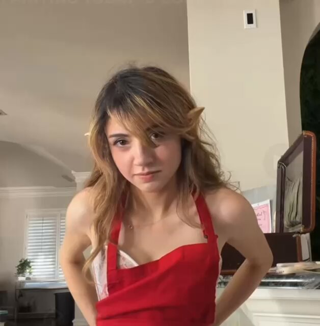 Brunette in a red apron with elf ears (@PitLoverzxx)