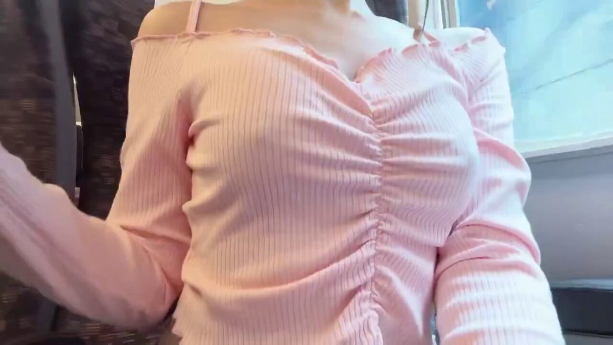 Woman in a pink ruched off-shoulder top (@kaanpakel)