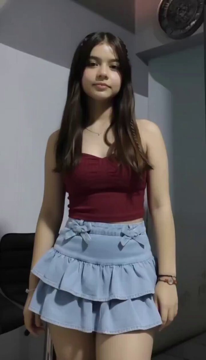 Brunette in a burgundy tube top and light blue ruffled bow mini (@UbjgxPhyttlfya)
