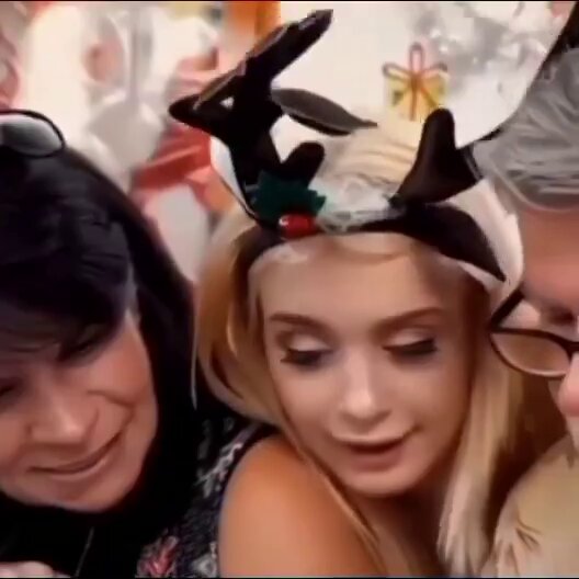 Blonde in a reindeer headband with two people (@pcKqQy9e7qYidlp)
