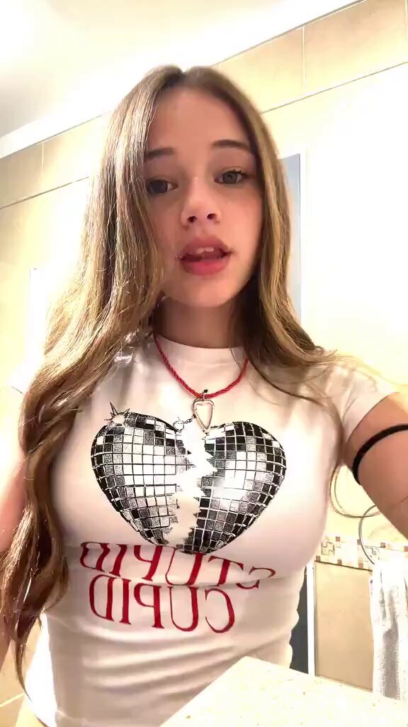Brunette in a white Stupid Cupid heart tee (@kenny1730761472)