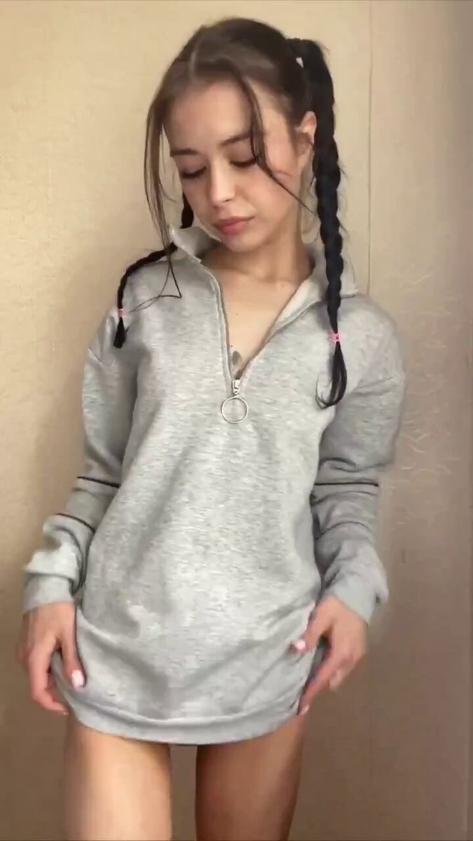 Brunette in pigtails and a gray zip pullover dress (@VoidLegendiq)