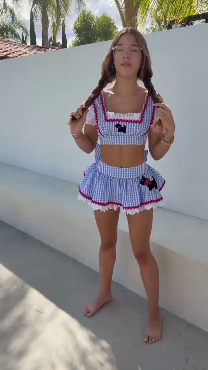 Brunette in a blue gingham dirndl crop and skirt with braids (@GreenGPT4)
