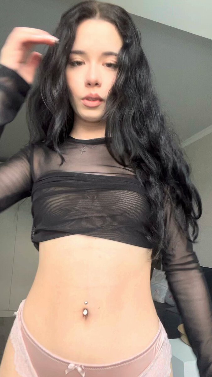 Brunette in a black sheer crop top and pink panties