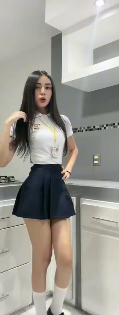 Brunette in a white polo and navy skirt (@arista_lul98382)