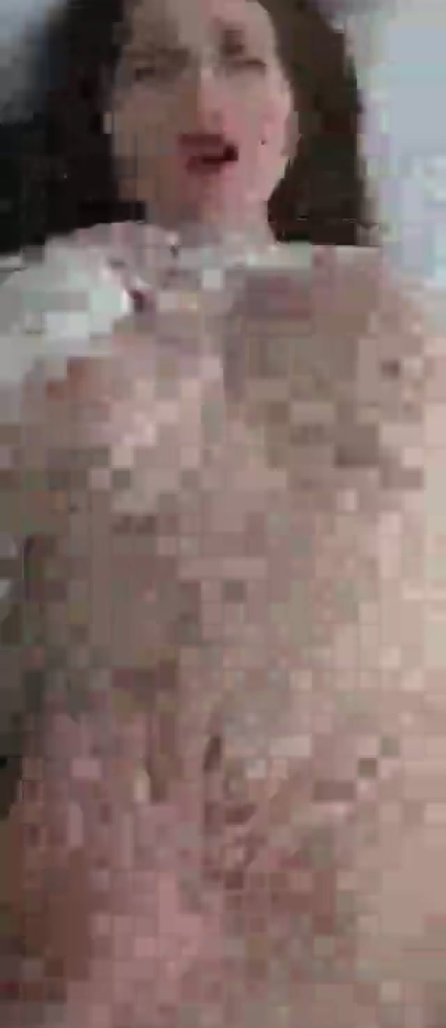 Blonde in a white top on a bed (@Sex_Chinema)