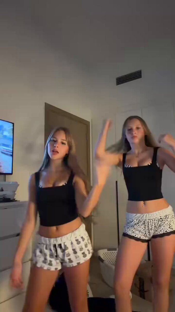 Two women in black tops and shorts (@Thononrl)